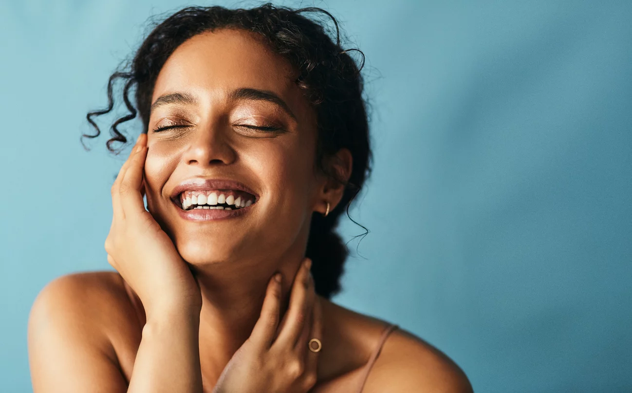 Smiling woman with healthy skin