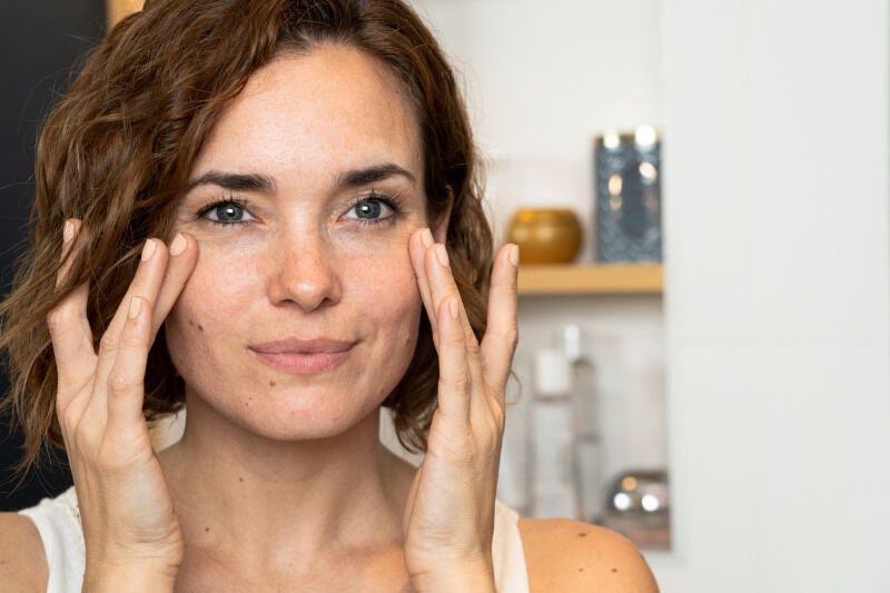  Face of woman over 30 with eyes closed